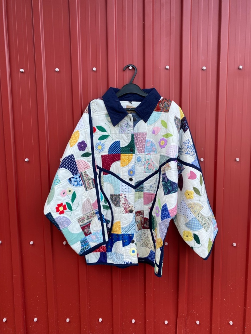 Patchwork Quilted Jacket with Navy Trim and Colorful Floral Blocks